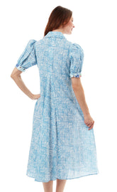 Dizzy-Lizzie Montauk Dress in turquoise and white with criss-cross design, lightweight fabric, sleeveless summer dress for women.