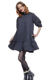 Dizzy-Lizzie St. Tropez black quilted poplin dress with oversized silhouette, featuring a soft, textured fabric and relaxed fit.