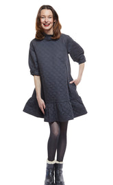 Dizzy-Lizzie St. Tropez black quilted poplin dress with an oversized silhouette, featuring a relaxed fit and soft, textured fabric.