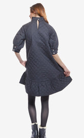 Dizzy-Lizzie St. Tropez black quilted poplin dress with oversized silhouette, featuring a soft, textured fabric and relaxed fit.