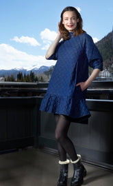 Dizzy-Lizzie St. Tropez quilted denim dress in oversized silhouette, showcasing a soft, textured fabric with a relaxed fit.