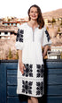 Black and white applique dress by Dizzy-Lizzie featuring a stylish design, shown on a hanger against a neutral background.