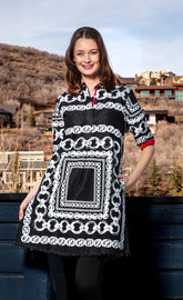 Dizzy-Lizzie black denim dress with white link pattern, fitted style, short sleeves, and round neckline.