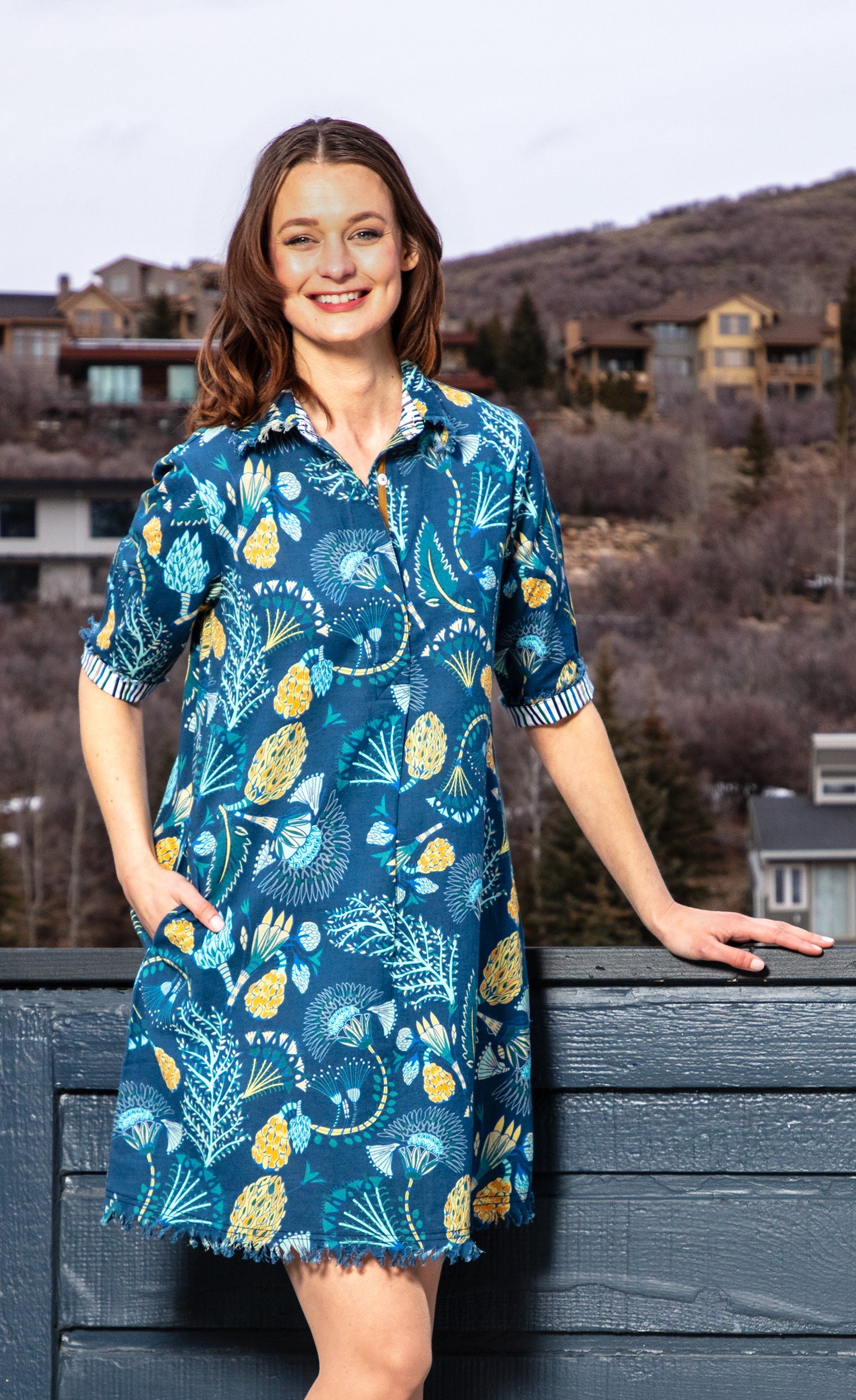 Blue Chatham Dress by Dizzy-Lizzie featuring an underwater print, sleeveless design, and knee-length silhouette.