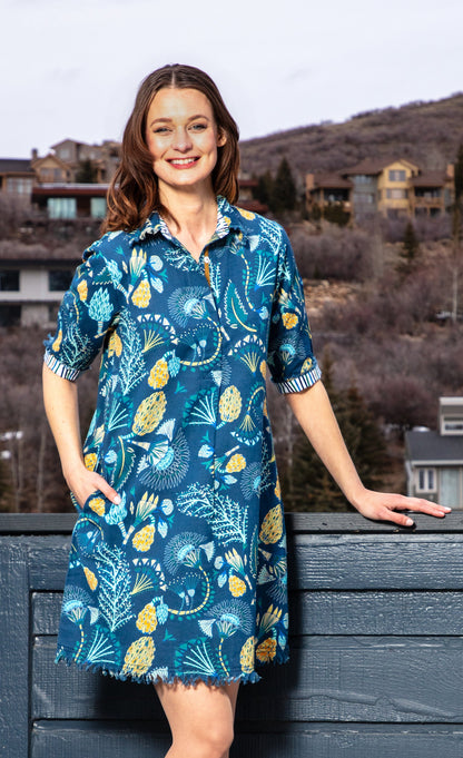 Blue Chatham Dress by Dizzy-Lizzie featuring an underwater print, sleeveless design, and knee-length silhouette.