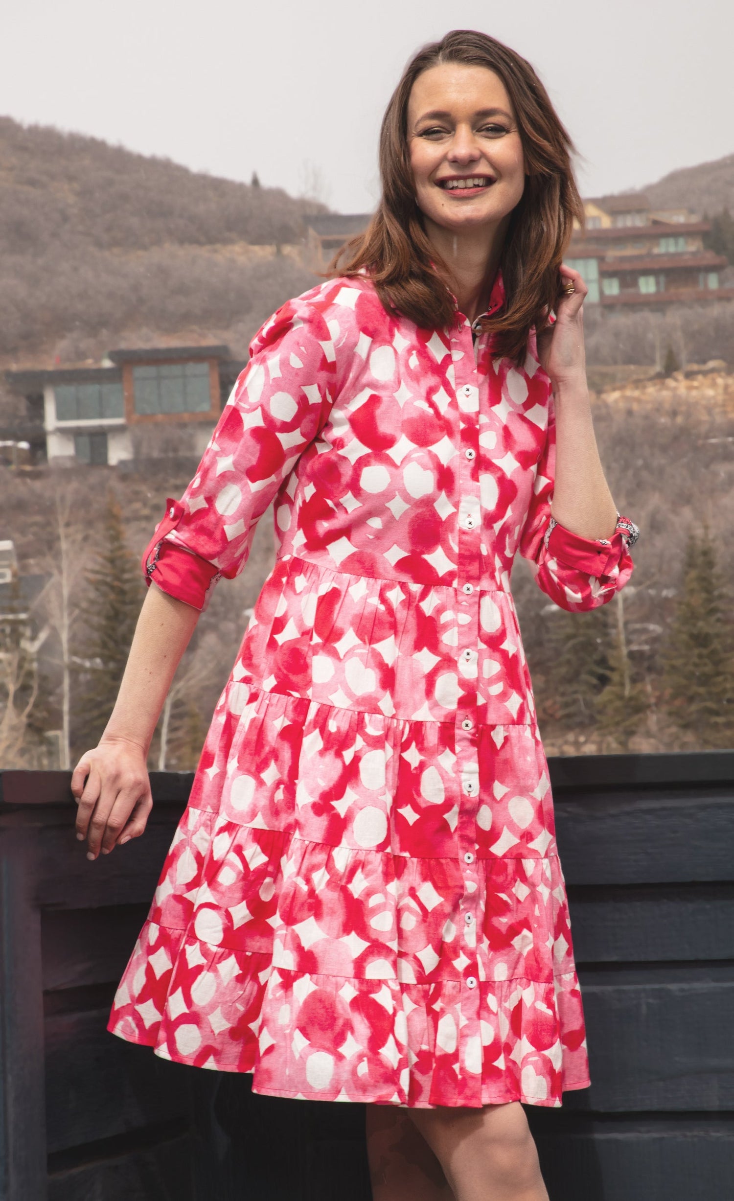 Pink watercolor print dress by Dizzy-Lizzie featuring a flowing design and vibrant floral patterns, perfect for casual or summer wear.