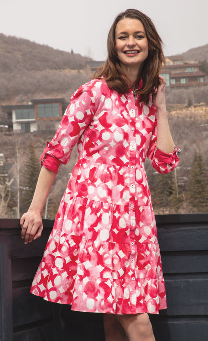 Pink watercolor print dress by Dizzy-Lizzie featuring a flowing design and vibrant floral patterns, perfect for casual or summer wear.