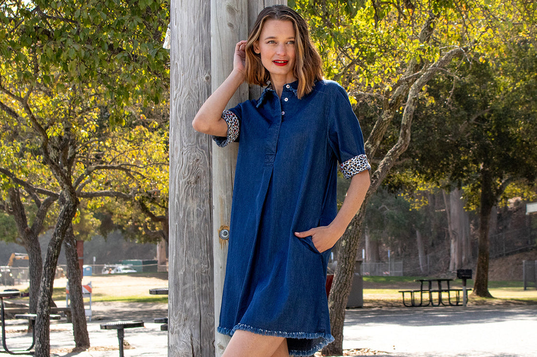 Light blue denim Hyannis Dress by Dizzy-Lizzie, front view showing a casual sleeveless dress with a fitted waist and knee-length hem.