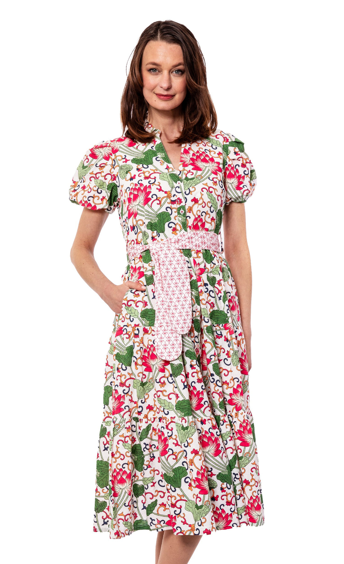 White floral Litchfield dress by Dizzy-Lizzie, with a flowy fabric and elegant design, shown on a model.