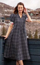 Black and white grid dress by Dizzy-Lizzie featuring a stylish, fitted silhouette perfect for casual or semi-formal occasions.