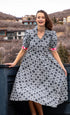 Dizzy-Lizzie Montauk Dress in black and white geometric pattern, stylish sleeveless dress with a flowing silhouette.