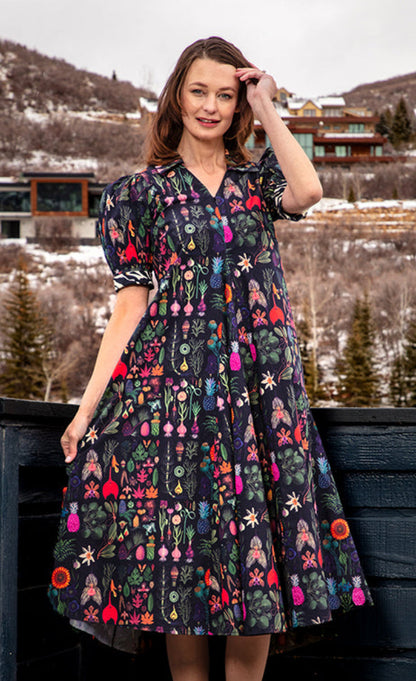Dizzy-Lizzie Montauk Dress with botanical print featuring flowy fabric and vibrant floral design on a lightweight dress.
