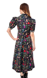 Dizzy-Lizzie Montauk Dress in botanical print, lightweight fabric, short sleeves, and flowy silhouette, perfect for summer wear.