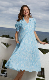 Light blue Montauk Dress by Dizzy-Lizzie featuring elephant and palm tree print, perfect for casual summer wear.