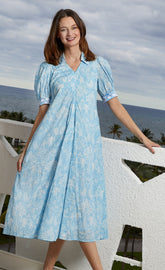 Light blue Montauk dress by Dizzy-Lizzie featuring elephant and palm tree print, perfect for casual summer wear.