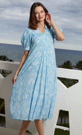 Light blue Montauk Dress by Dizzy-Lizzie with elephant and palm tree print, perfect for casual summer wear.