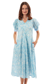 Light blue Montauk dress by Dizzy-Lizzie featuring elephant and palm tree print, perfect for casual summer wear.