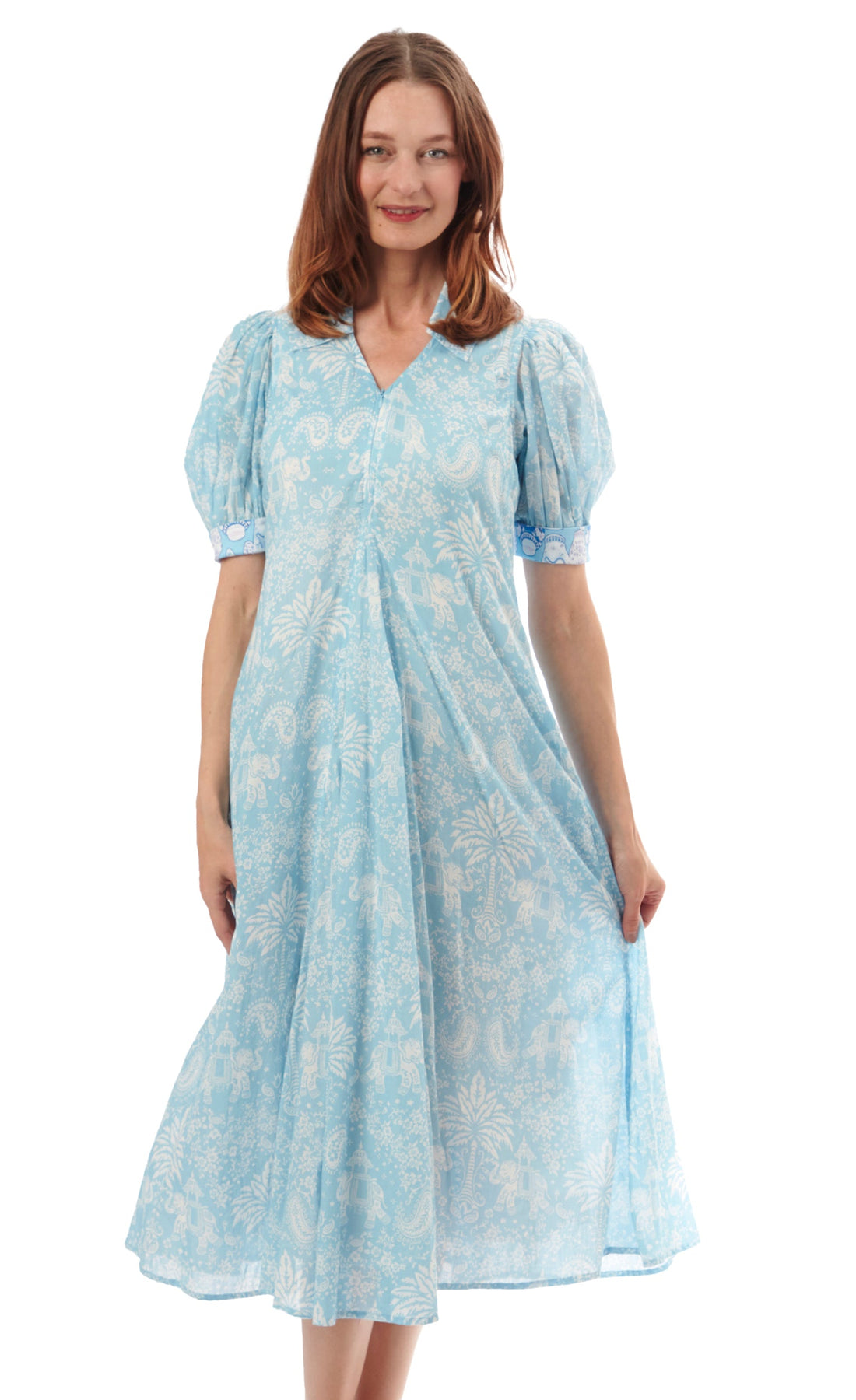 Light blue Montauk Dress by Dizzy-Lizzie featuring elephant and palm tree print, perfect for casual summer wear.