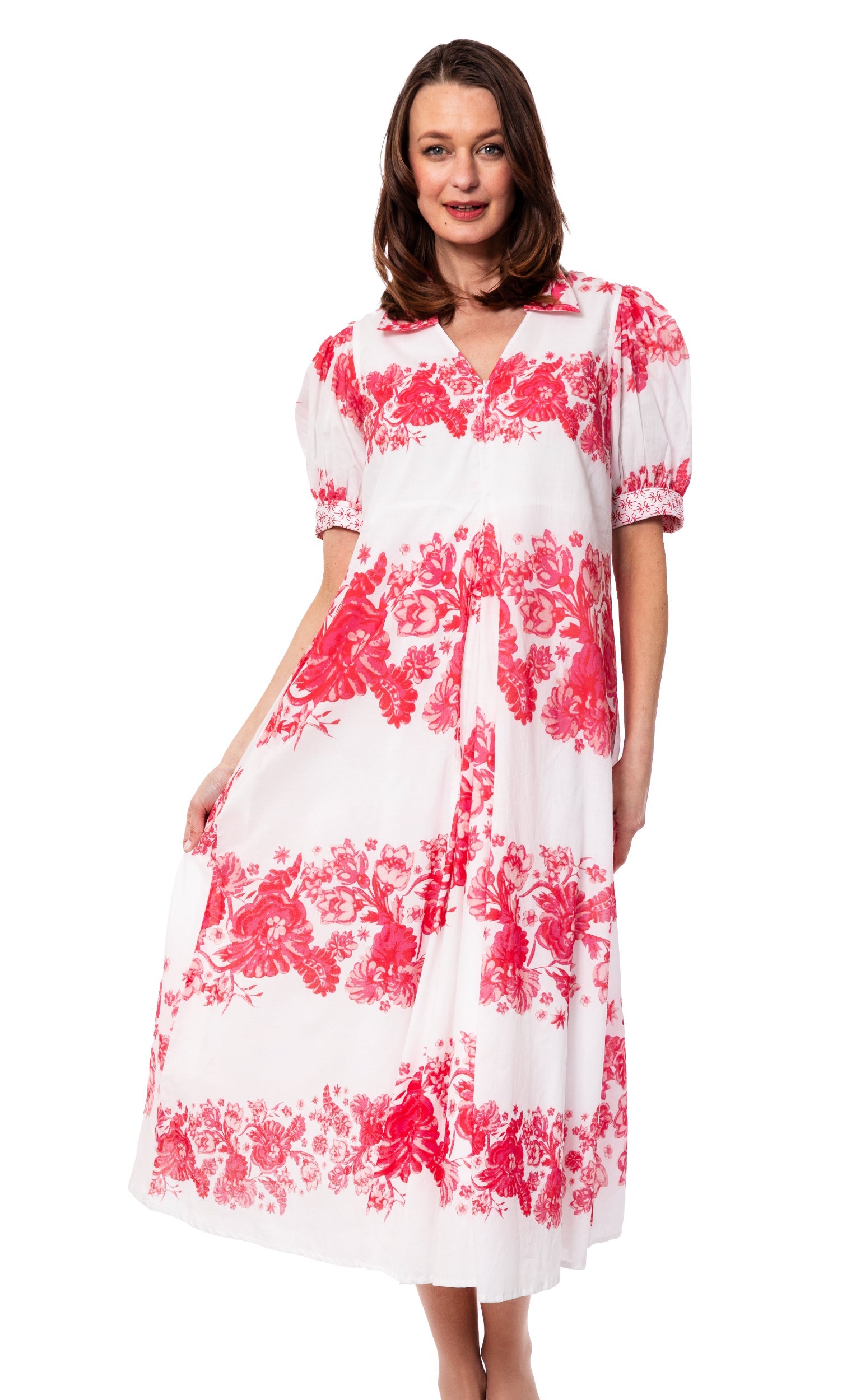 Pink floral print Montauk Dress by Dizzy-Lizzie, flowing fabric with a fitted waist and sleeveless design.