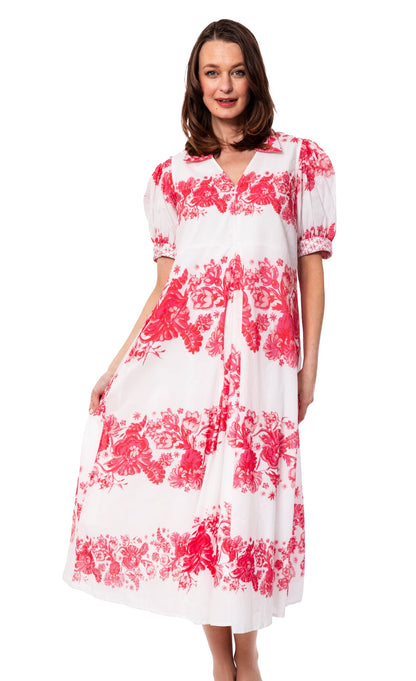 Pink floral print Montauk Dress by Dizzy-Lizzie, flowing fabric with a fitted waist and sleeveless design.