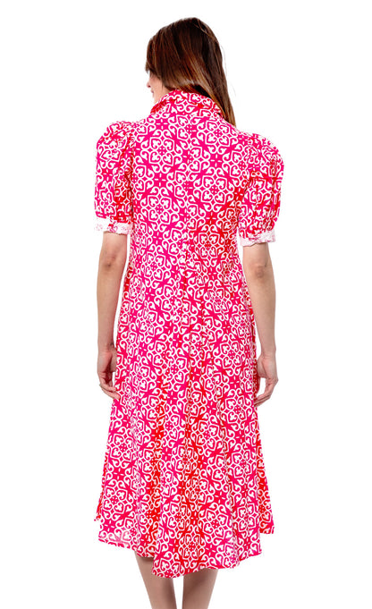 Pink and white geometric print Montauk dress by Dizzy-Lizzie, featuring a stylish and comfortable women&