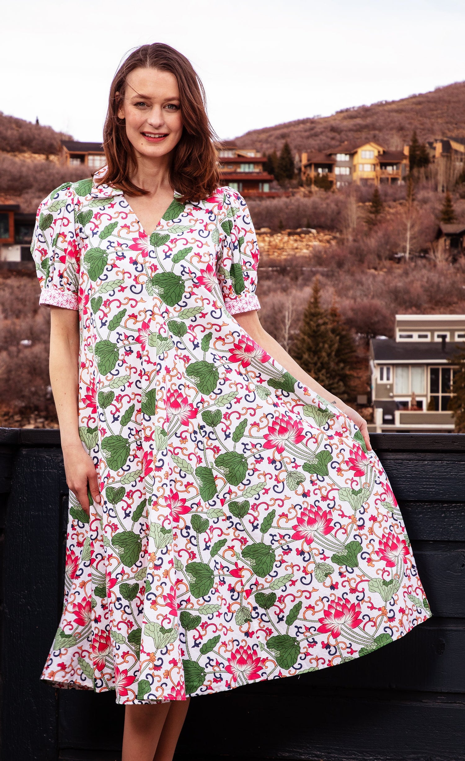 White floral Montauk Dress by Dizzy-Lizzie, featuring a flowing fabric and elegant design, perfect for summer occasions.