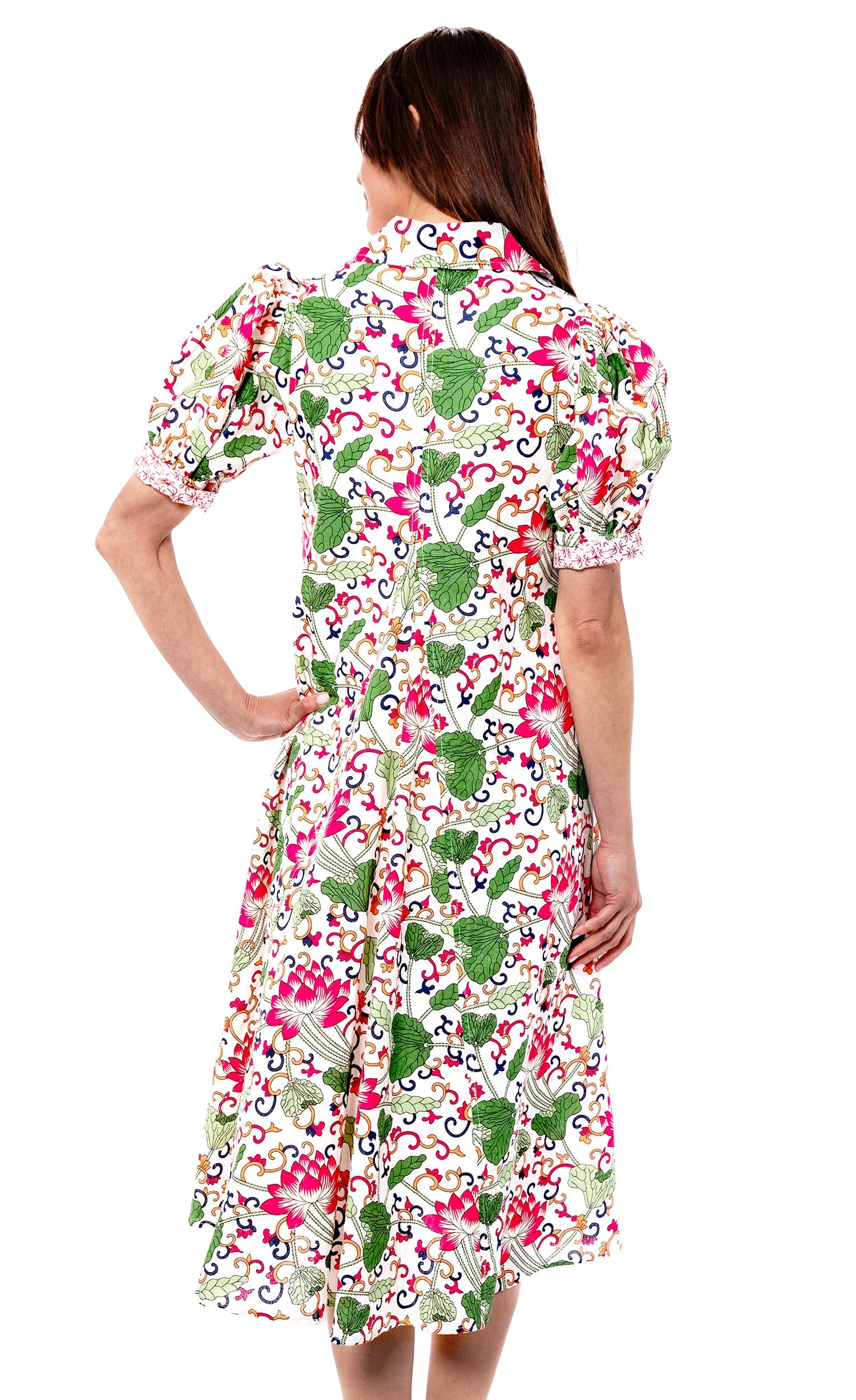 White floral Montauk Dress by Dizzy-Lizzie featuring a flowy design and lightweight fabric, perfect for summer wear.