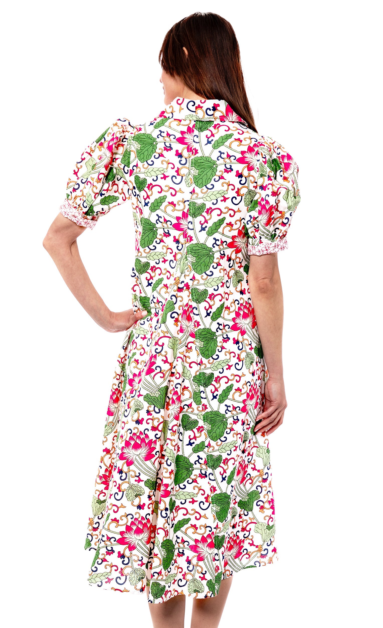 White floral Montauk Dress by Dizzy-Lizzie featuring a flowy design and lightweight fabric, perfect for summer wear.