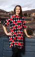 Red and black big dot dress by Dizzy-Lizzie featuring a stylish, flowing design perfect for casual and semi-formal occasions.