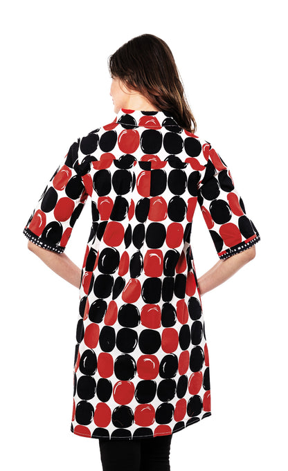Red and black polka dot dress from Dizzy-Lizzie featuring a stylish Monterey design and flowing fabric.