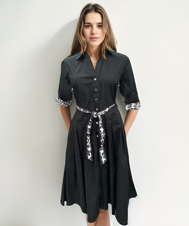 Dizzy-Lizzie Mrs Maisel Black Stretch Poplin dress, fitted style with long sleeves and classic design, shown on a mannequin.