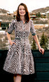 Dizzy-Lizzie Mrs. Maisel chocolate zebra print dress with fitted silhouette and stylish design, perfect for fashionable occasions.