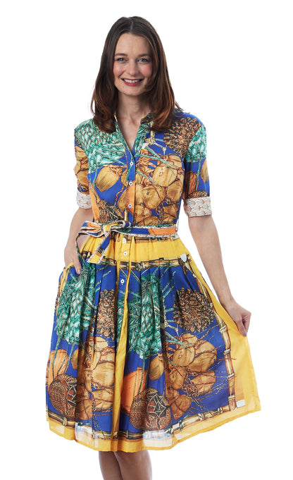Dizzy-Lizzie Mrs Maisel Coconut Print dress with vibrant tropical coconut pattern, knee-length style, and flattering fit.