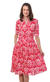 Pink and white Mrs. Maisel-inspired ikat dress by Dizzy-Lizzie, featuring vibrant patterns and a stylish, vintage-inspired fit.