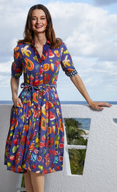 Dizzy-Lizzie Mrs Maisel fruit print dress in XS featuring colorful fruit patterns on a stylish dress.