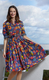 Dizzy-Lizzie Mrs Maisel fruit print dress in XS with colorful fruit pattern and classic fit, perfect for casual or semi-formal wear.