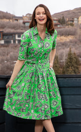 Dizzy-Lizzie Mrs Maisel green and black whimsy print dress, XS size, showcasing vibrant pattern and stylish fit.
