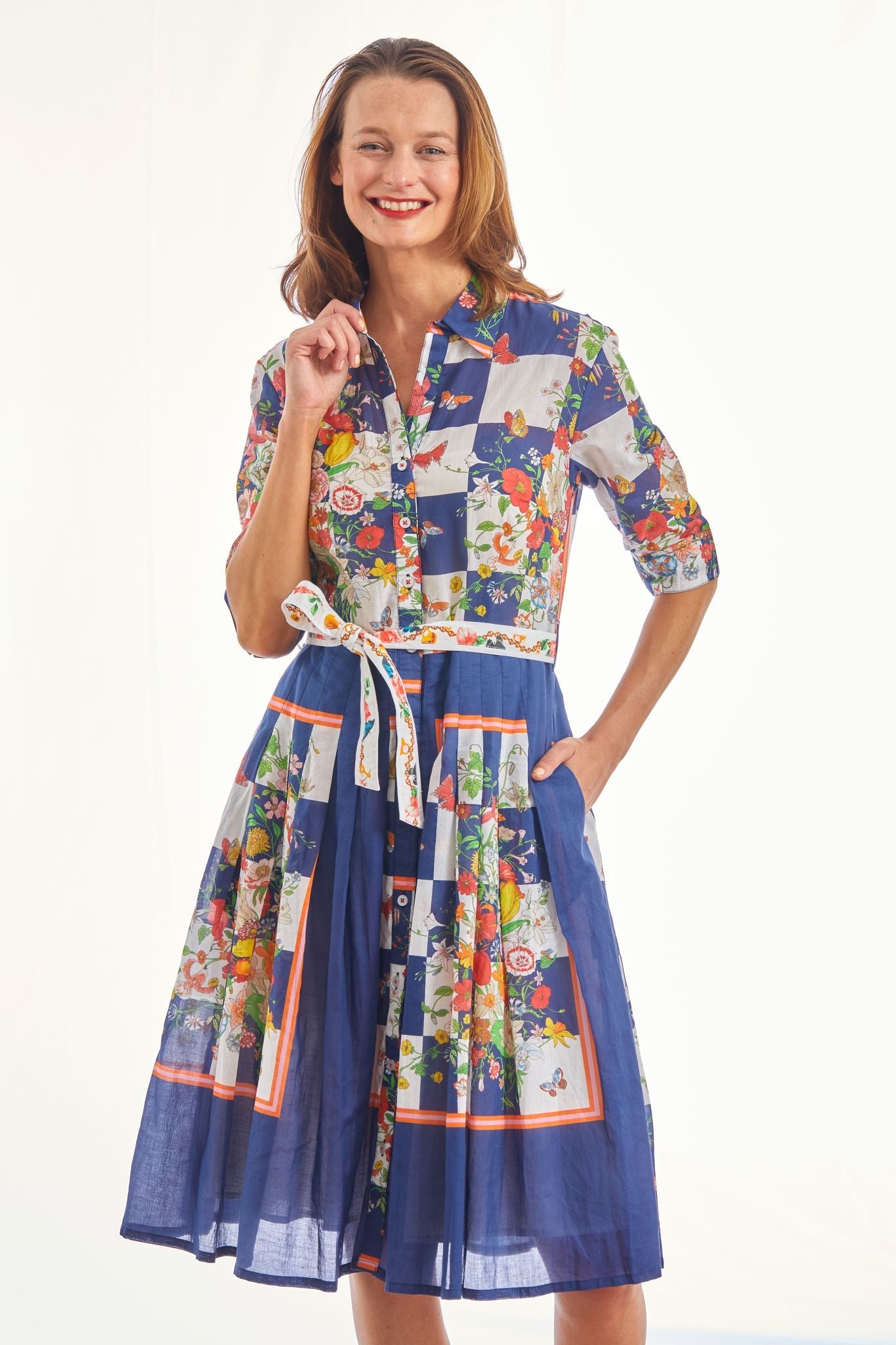 Dizzy-Lizzie Mrs Maisel navy dress with box print and butterfly pattern, featuring a stylish, vintage-inspired design.