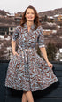 Dizzy-Lizzie Mrs. Maisel turquoise and chocolate zebra print dress with a stylish fit and vibrant pattern.