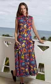 Sea Island Dress by Dizzy-Lizzie with vibrant fruit print, lightweight fabric, sleeveless design, perfect for summer wear.