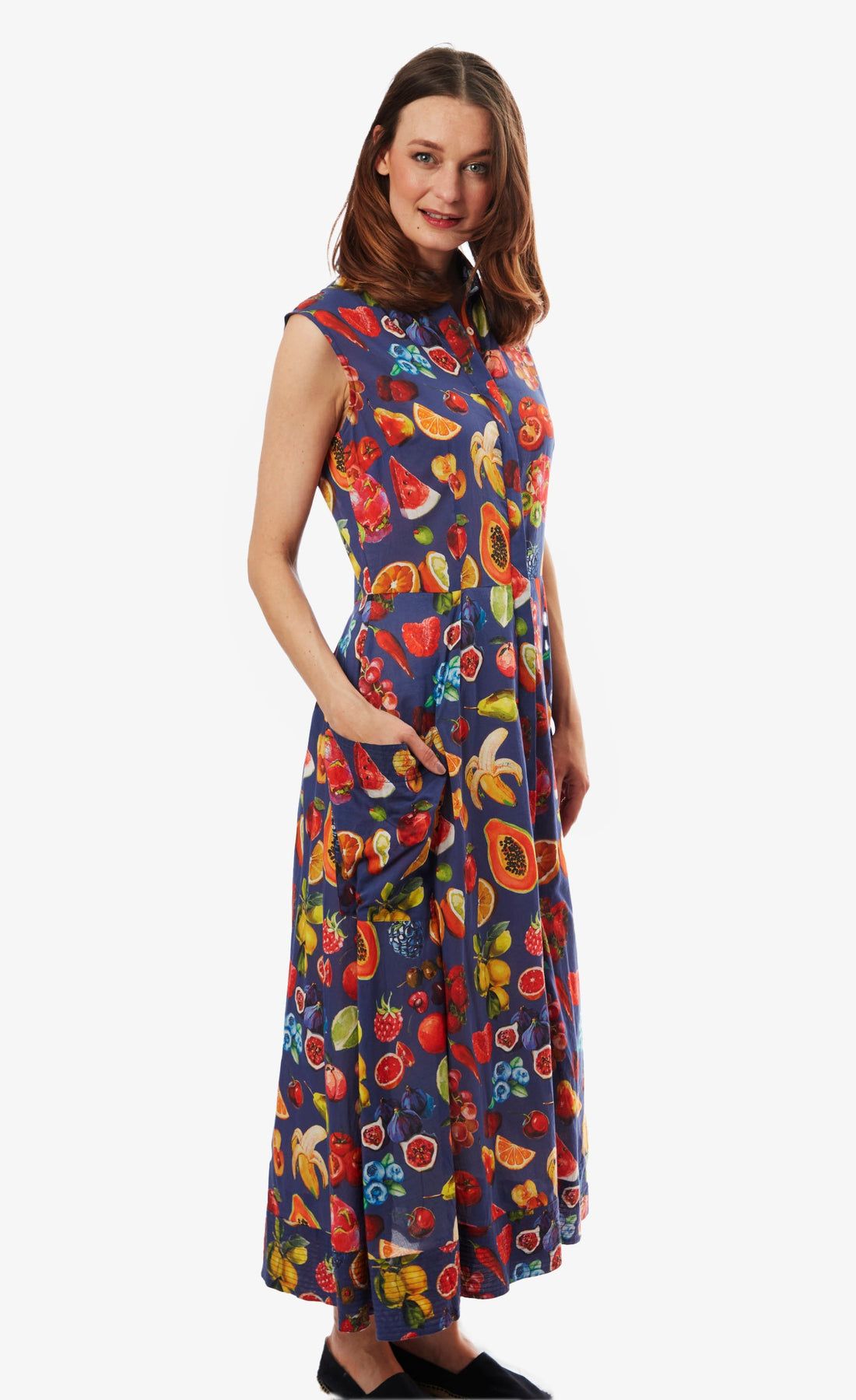 Dizzy-Lizzie Sea Island Dress with colorful fruit print, lightweight fabric, and sleeveless design perfect for warm weather.