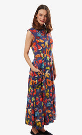 Sea Island Fruit Print Dress by Dizzy-Lizzie, showing a lightweight, colorful dress with a tropical fruit pattern and sleeveless design.