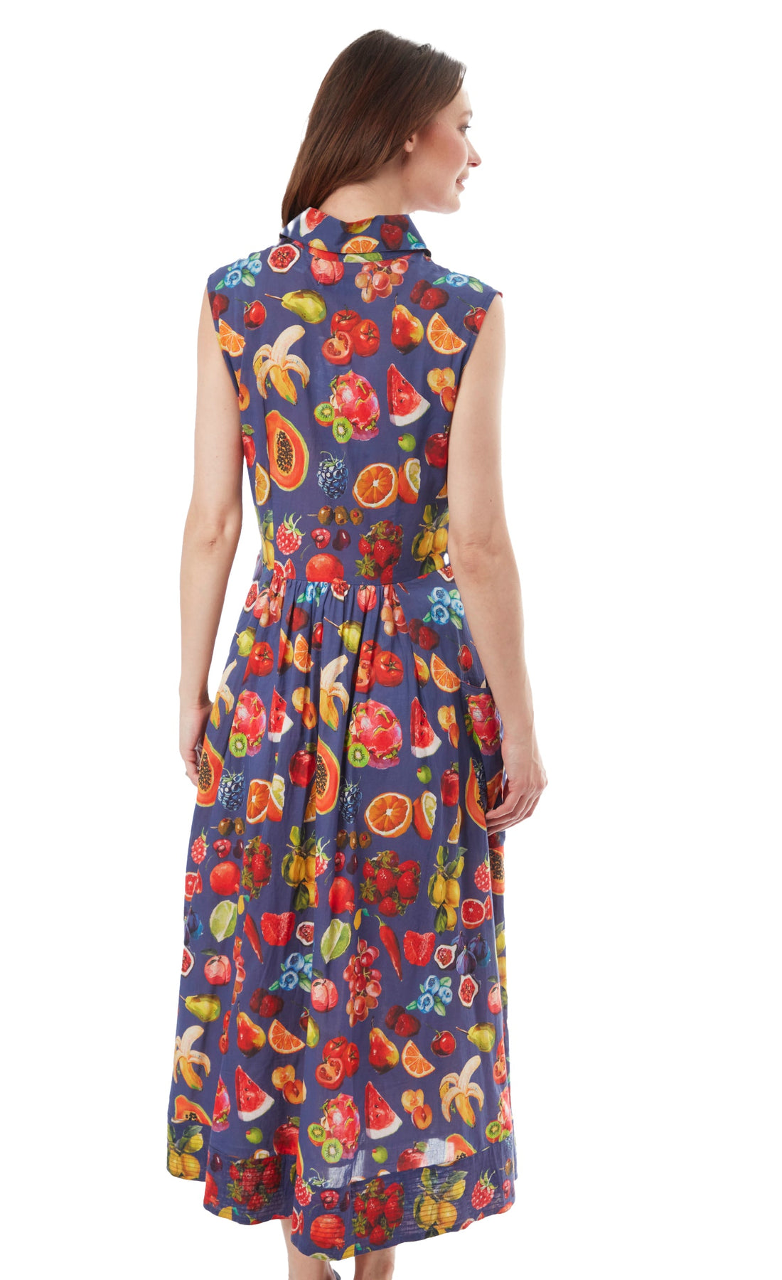 Sea Island Dress by Dizzy-Lizzie featuring a vibrant fruit print, sleeveless design, and lightweight fabric perfect for summer.