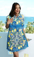 Dizzy-Lizzie Chatham Lemons print cotton linen dress with floral lemon pattern and casual fit on a model.