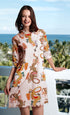 Dizzy-Lizzie Chatham Natural Ground Dragon Print cotton linen dress with a relaxed fit and floral pattern.