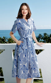 Dizzy-Lizzie Hudson tiered dress in navy and white geometric pattern, sleeveless with a flowy, layered design.