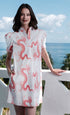 Left Bank Puff Sleeve Cotton Dress in coral with white dragon print by Dizzy-Lizzie, featuring puffed sleeves and a flowy silhouette.