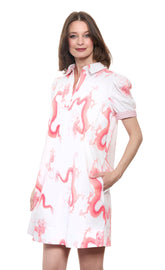 Dizzy-Lizzie Left Bank puff sleeve cotton dress in coral with white dragon print, featuring a stylish and comfortable dress design.