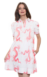 Dizzy-Lizzie Left Bank puff sleeve cotton dress in coral with white dragon print, featuring a stylish, casual dress design.
