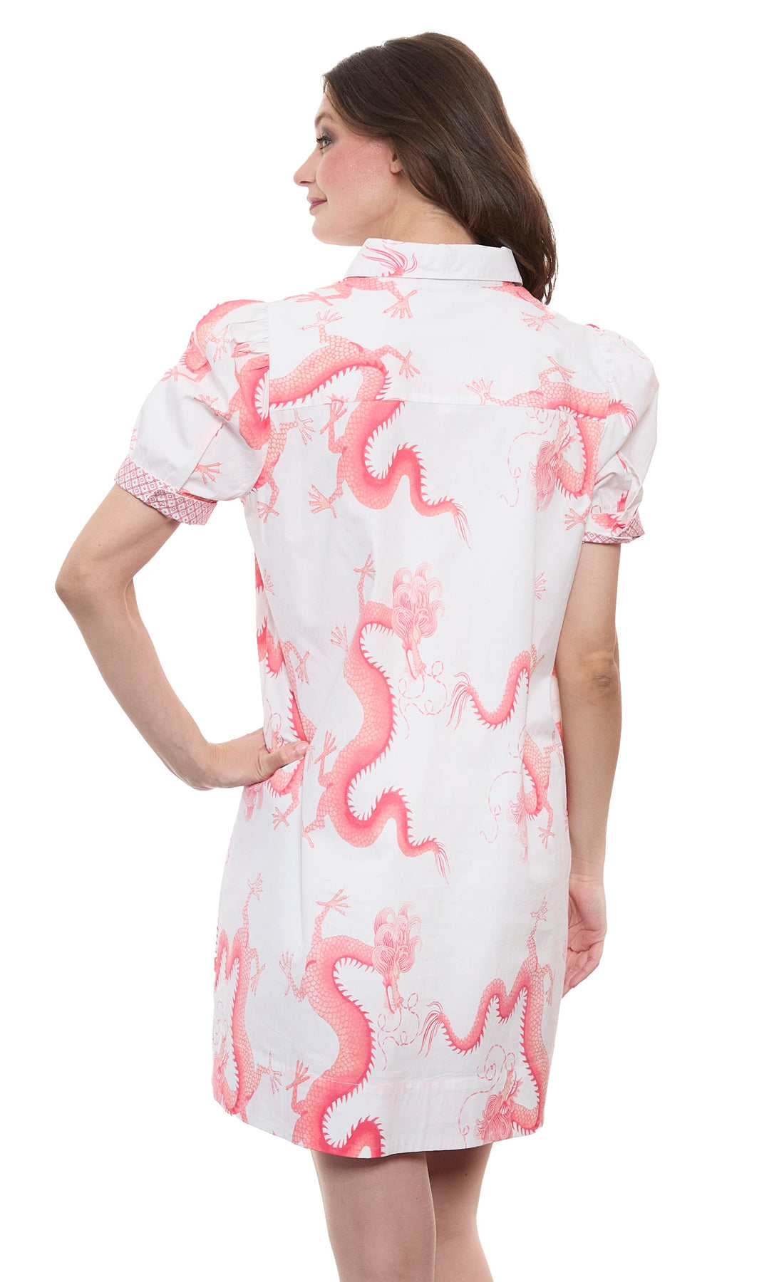 Left Bank puff sleeve cotton dress by Dizzy-Lizzie in coral with white dragon print, featuring a stylish, feminine design.